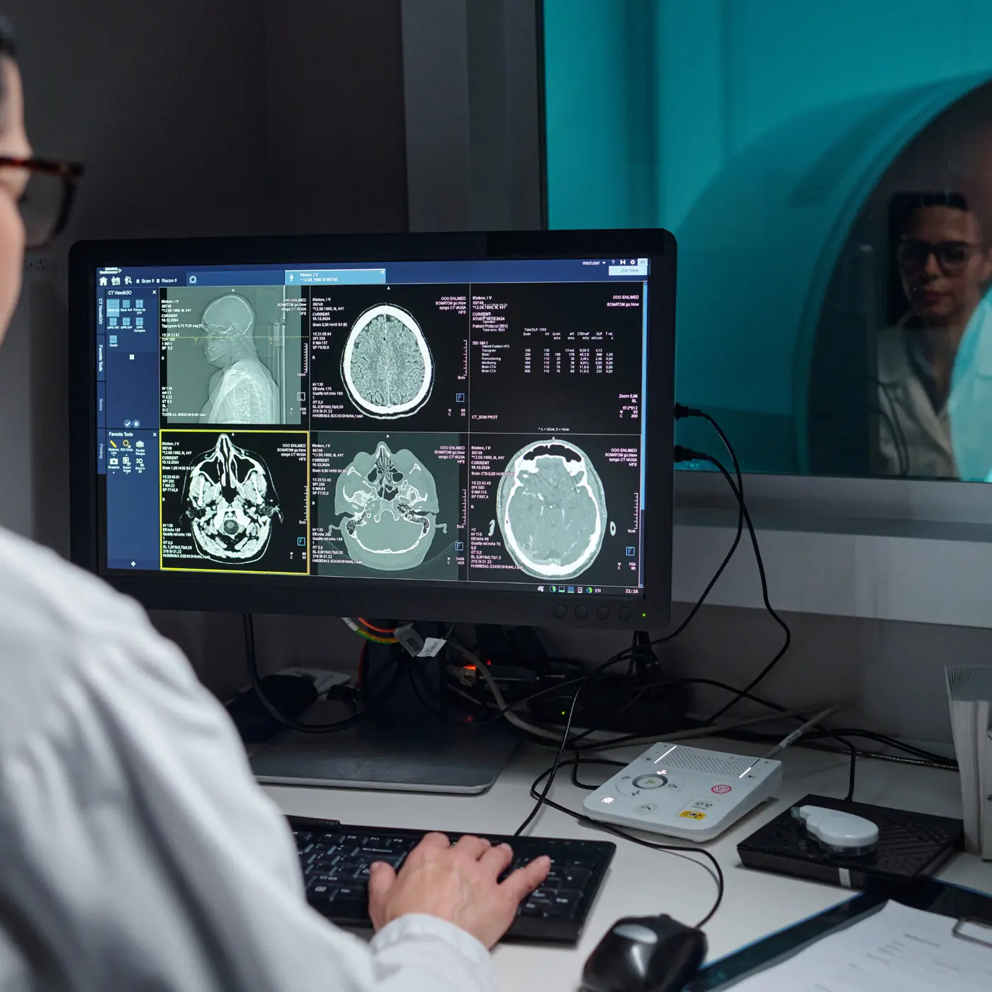Clinician reviewing diagnostic images on a workstation